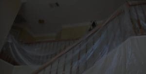 view of the house wrapped with polythene during renovation