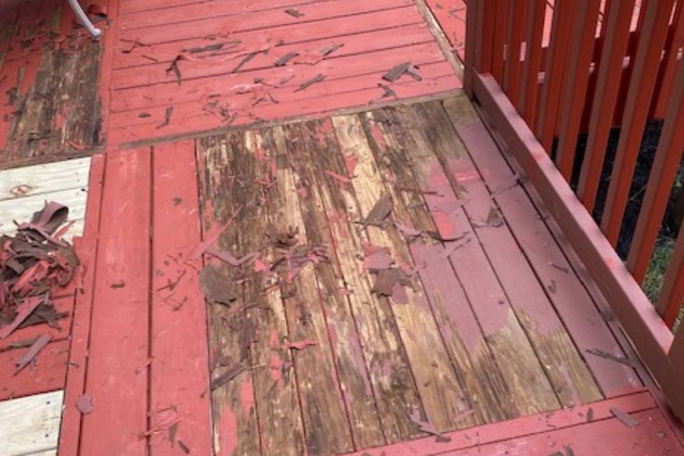 view of the deck outside house before renovation