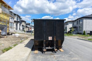 Dumpster outside of a home construction